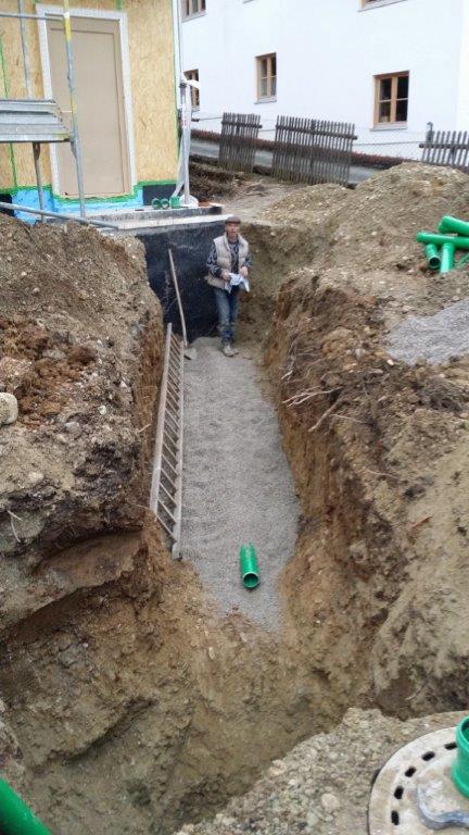 Kanalarbeiten und Regenentwässerung mit Regenwasserzisterne für ein Einfamilienhaus in Schäftlarn